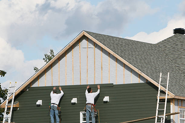 Professional Vinyl Siding technician working in Hutchinson, PA